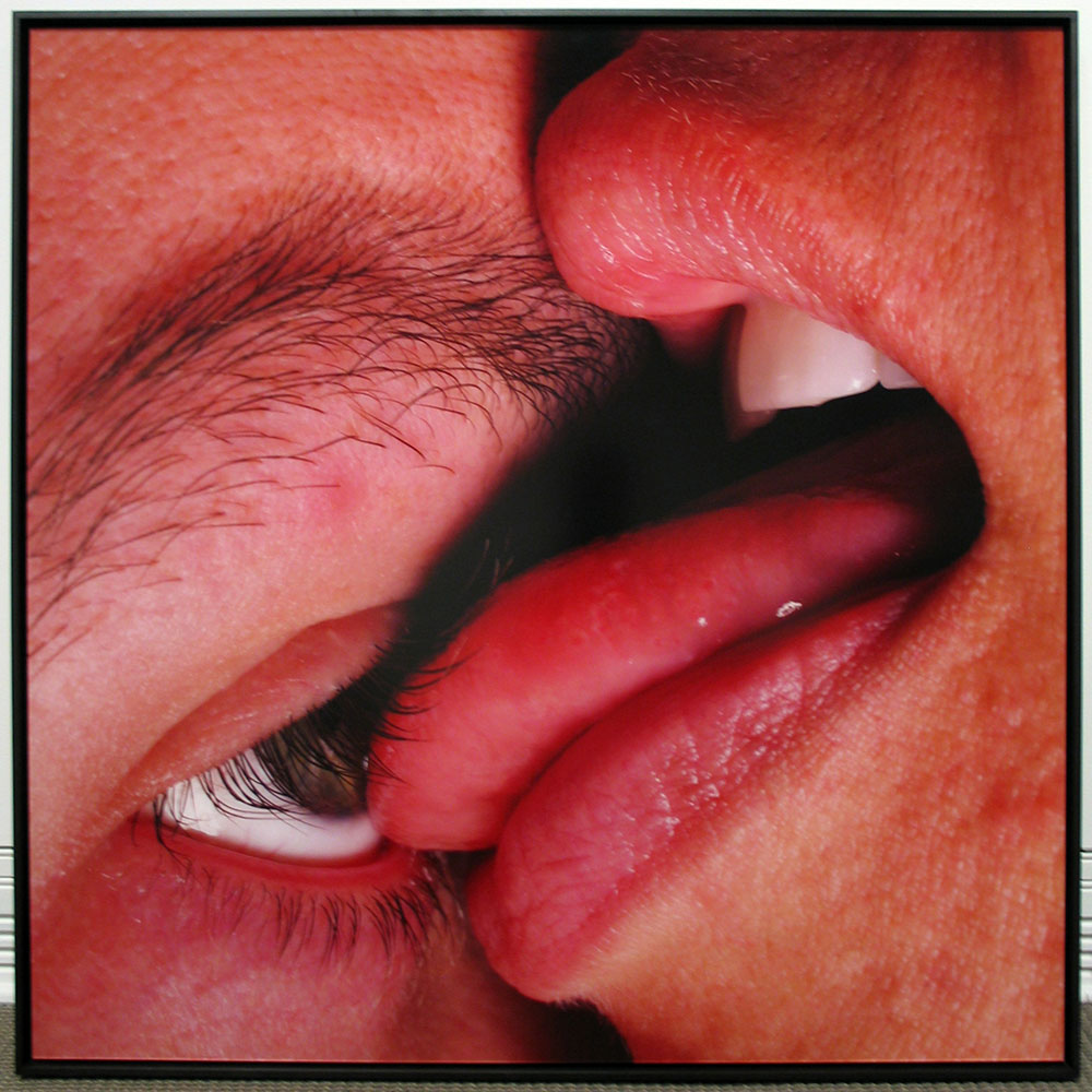 close-up photo of someone licking someone else's eyeball