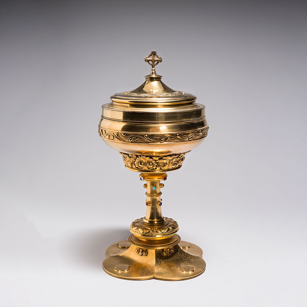 Gold ciborium, or stem cup with lid