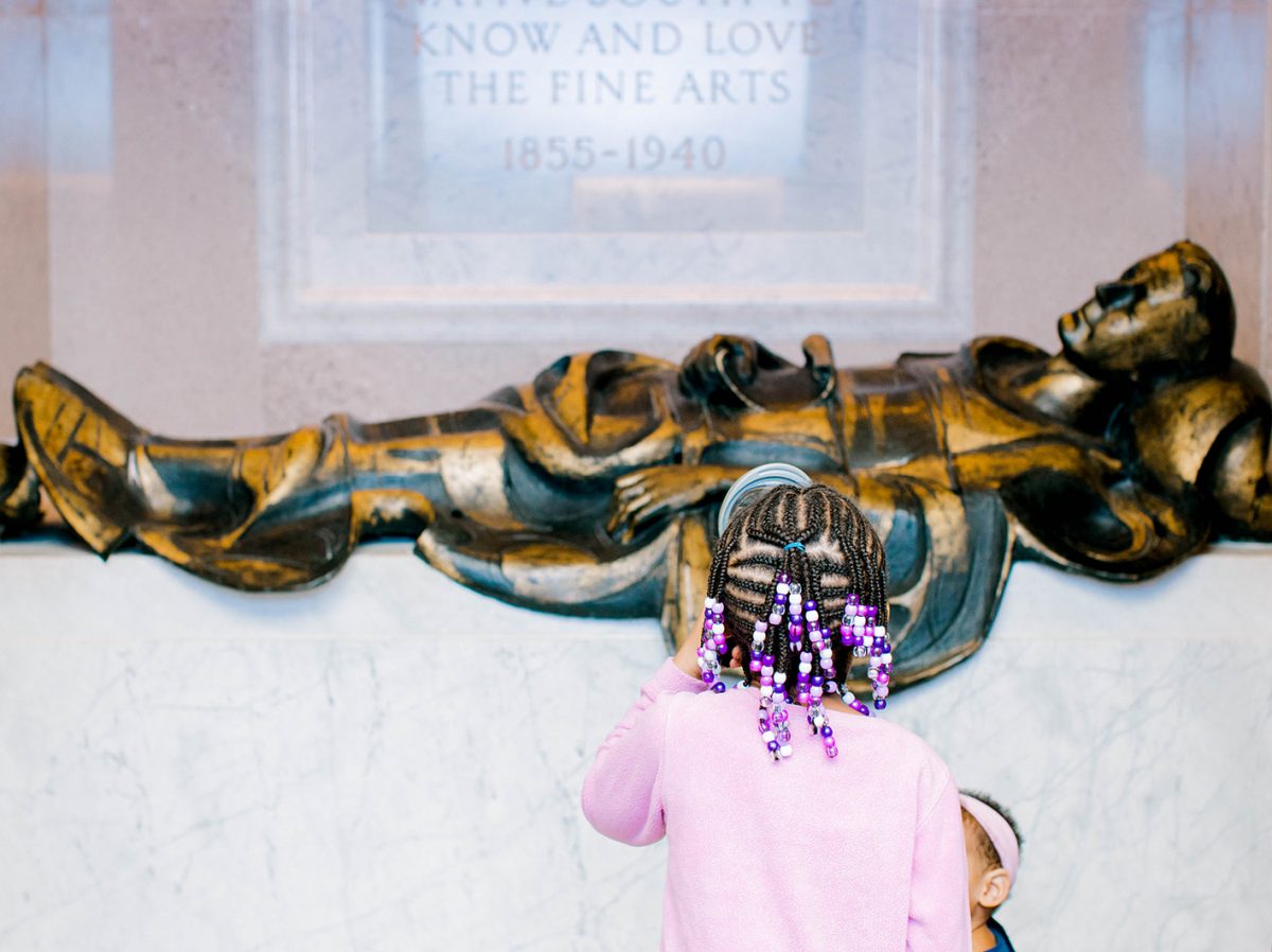 children look at the tomb of William Hayes Ackland at the University of North Carolina