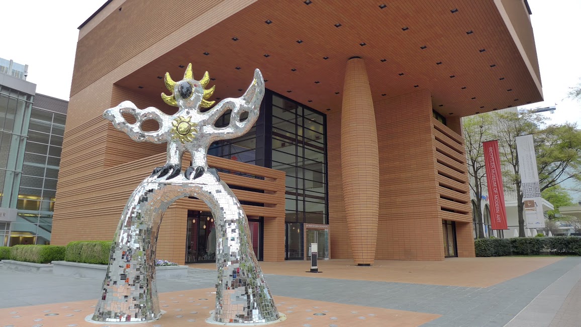 large metal sculpture outside a museum building