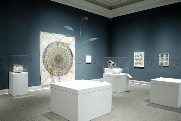 Art museum gallery showing Japanese ceramics and paintings