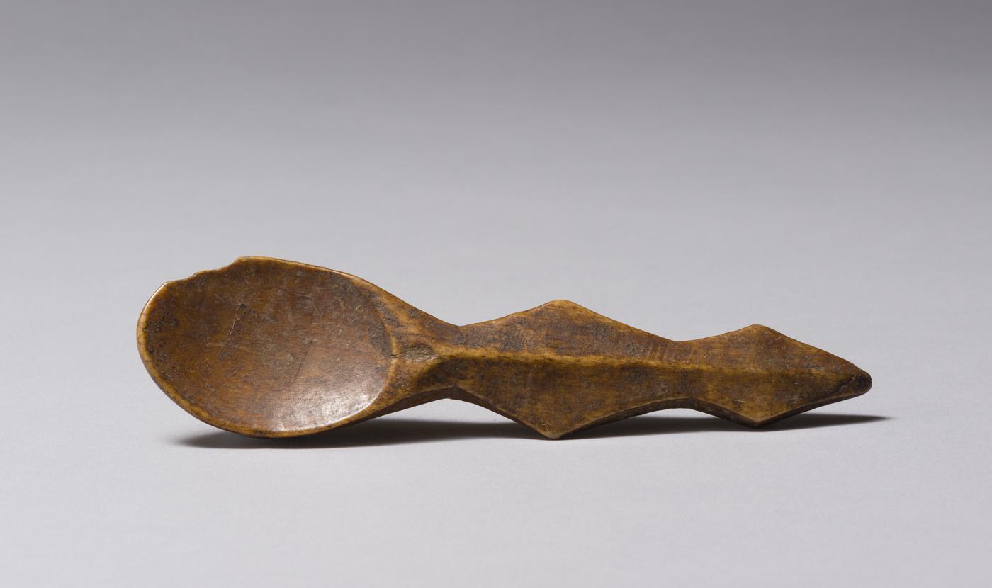 A carved wooden spoon
