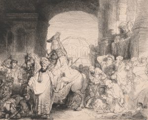 A man wearing a large hat sitting on a horse that's being led by a man in a turban