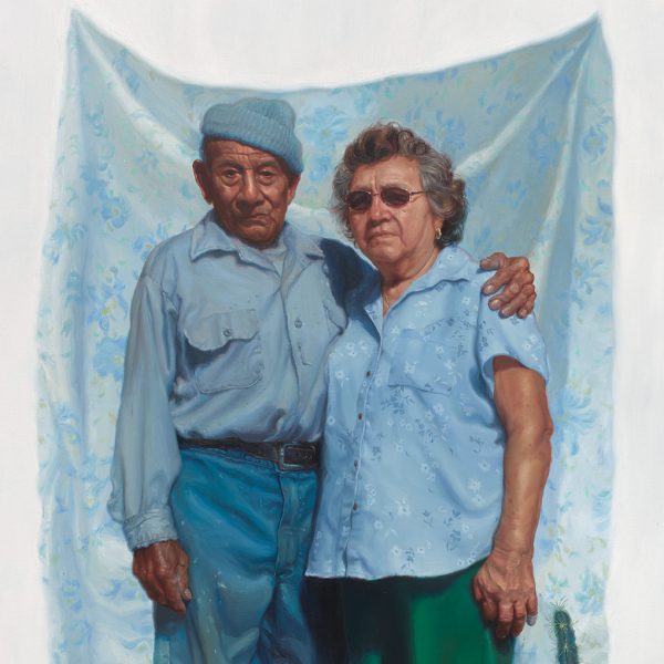 A painting of an elder couple dressed in blue in front of a blue backdrop